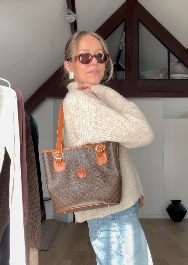 Dena wearing a Cossac wool alpaca turtleneck from Noumenon with her own vintage Céline Macadam bag, up for sale on her Vinted shop
